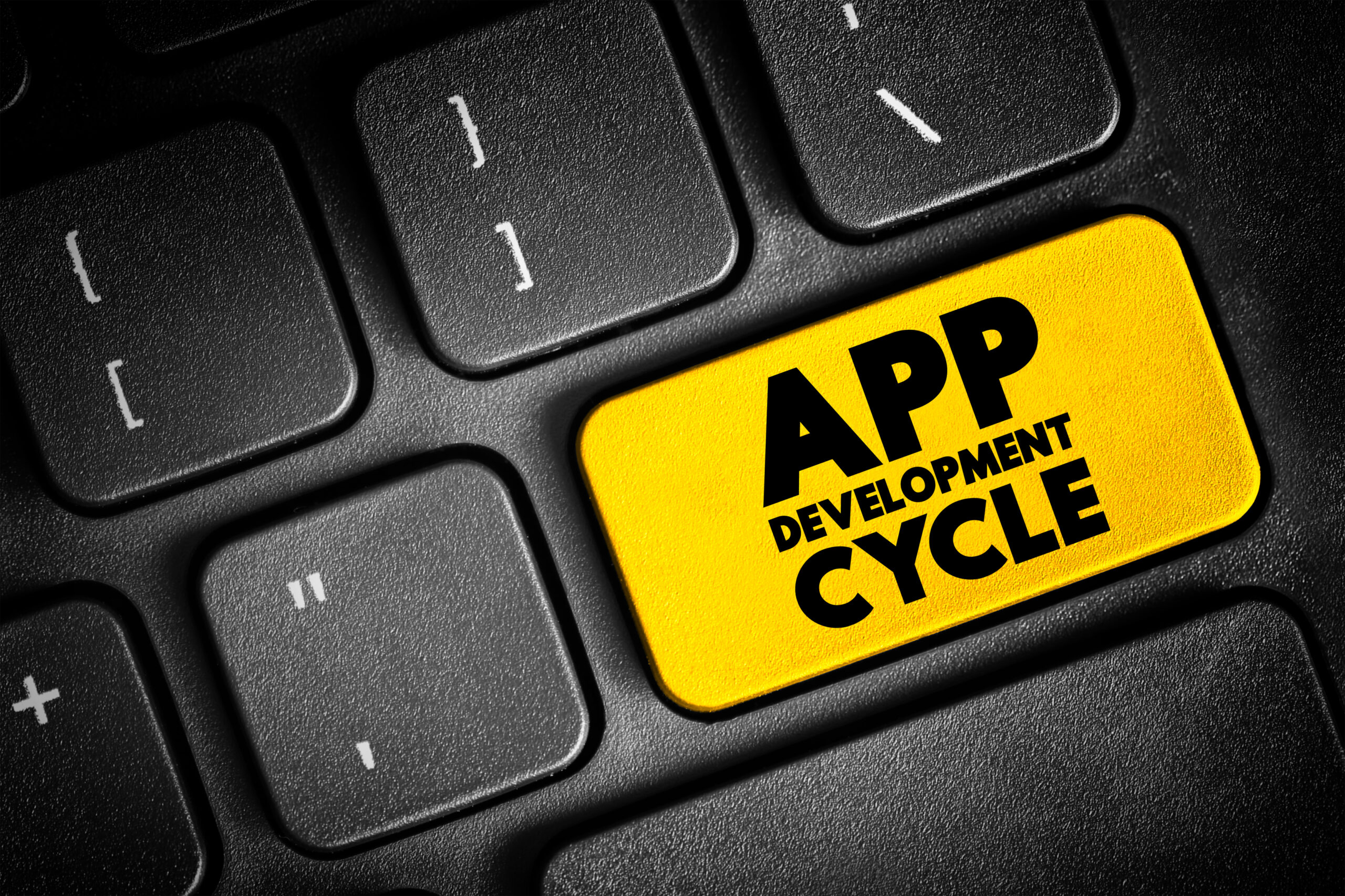 App Development Cycle text concept button on keyboard for presen